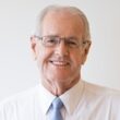 Portrait of smiling senior businessman having idea Portrait of smiling senior businessman having idea